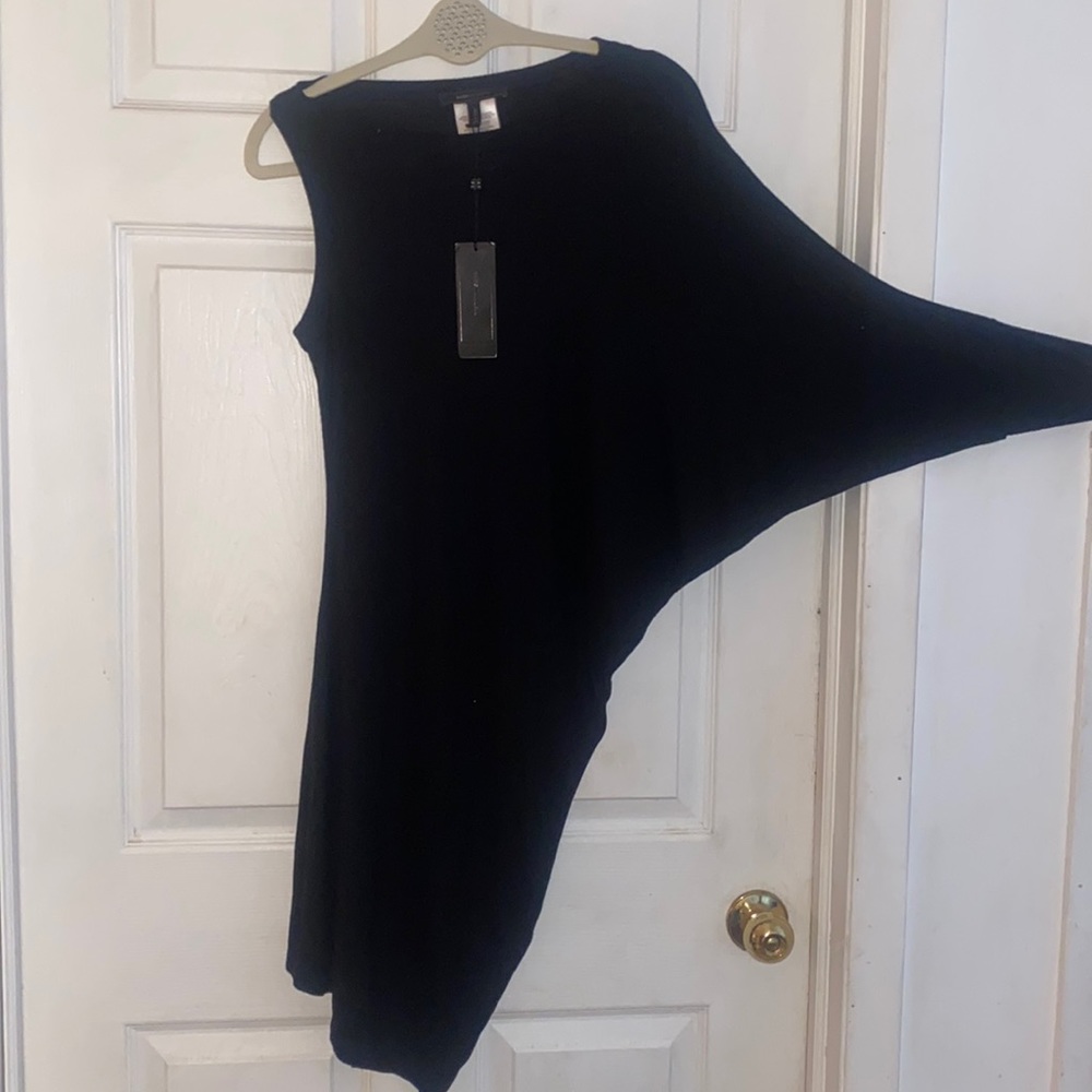 BCBG black knit knee-length dress. Dolman sleeve on one side Med NWT